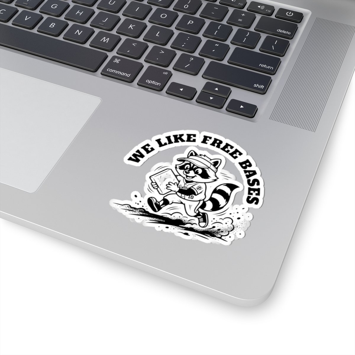 we like free bases raccoon softball sticker we like free bases raccoon softball sticker